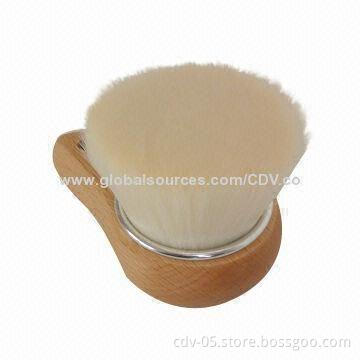 Facial brush with wooden handle